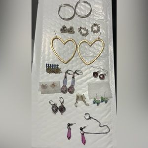 12 pairs of earrings. Great condition. Include earring backs.